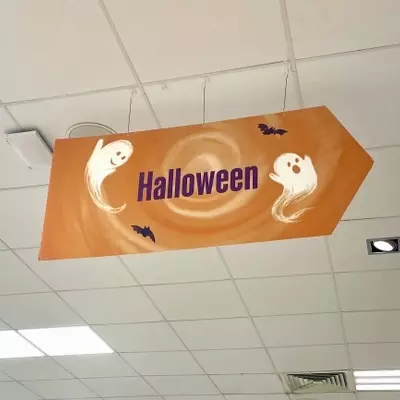 an illustration for Waitrose supermarket, featuring hand illustrated ghosts and bats on an orange background 